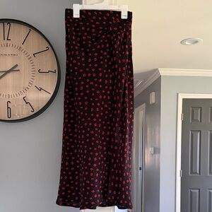 Princess Polly Black Skirt with Red Floral Design